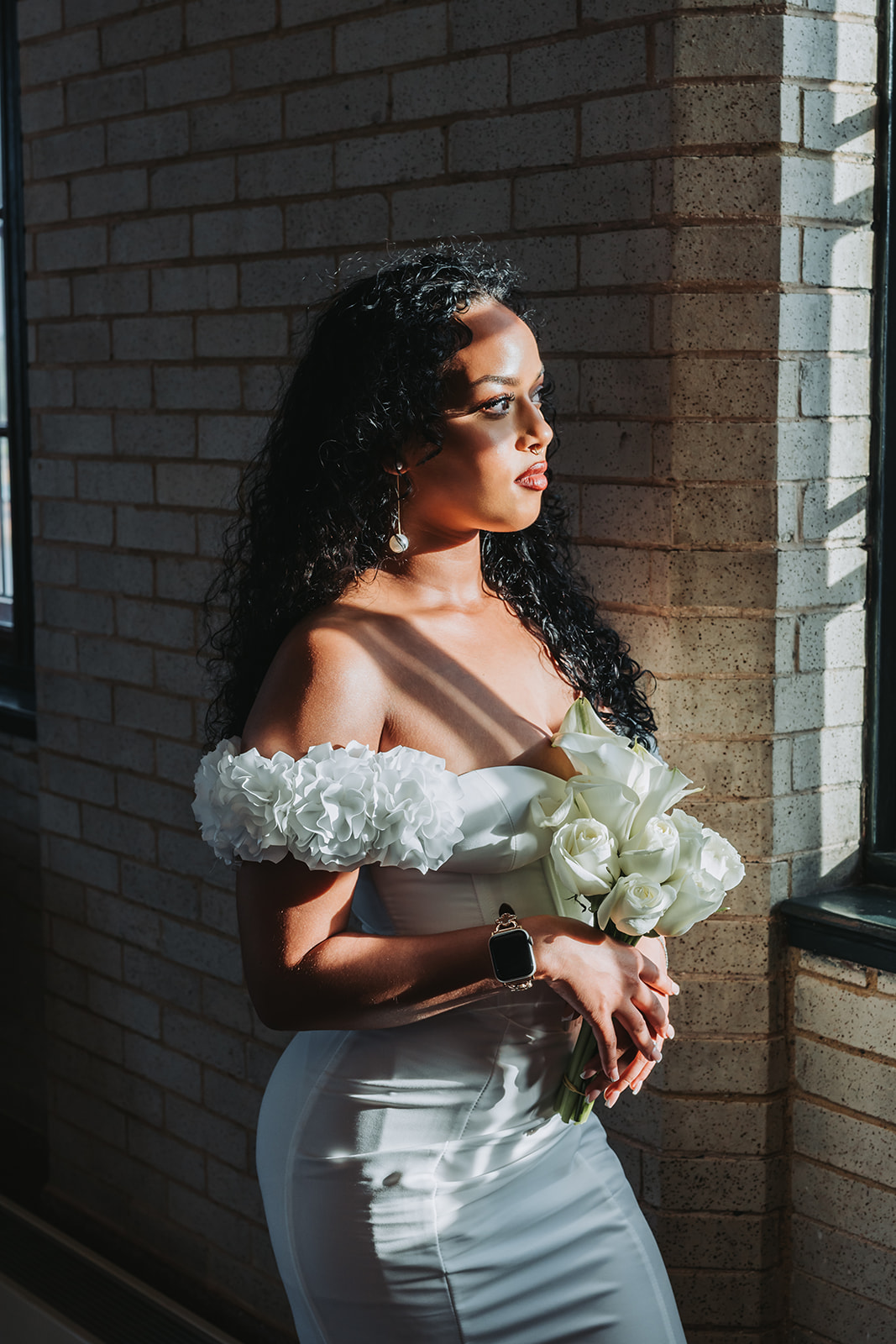 Bride looking out the window